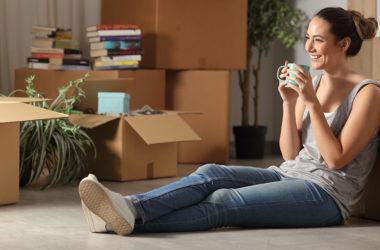 young woman in an apartment she's renting